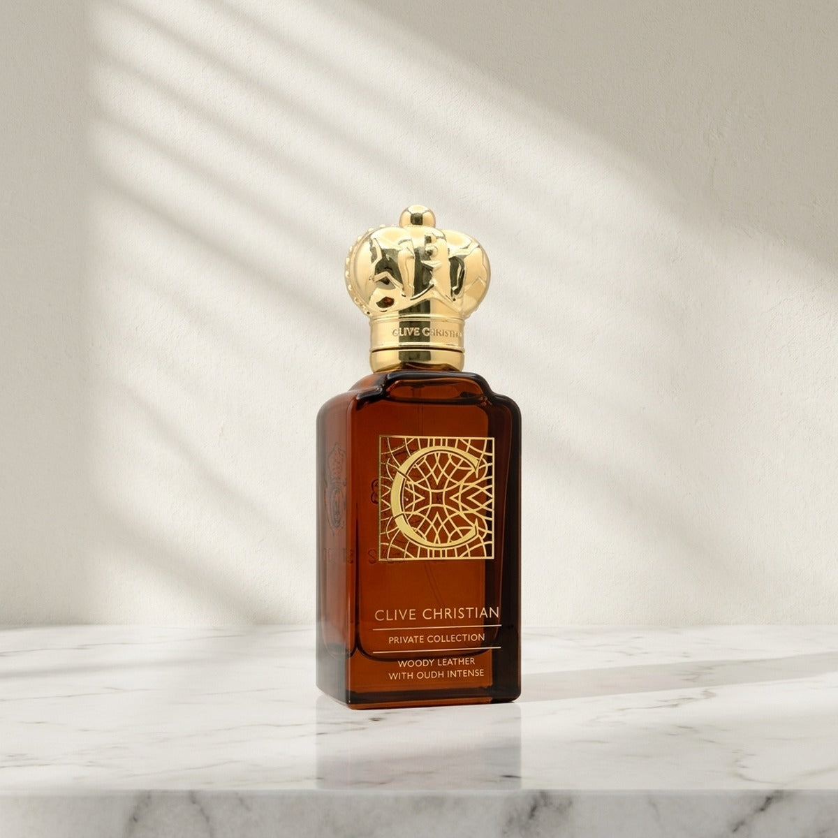 C for Woody Leather With Oudh Intense — bottle